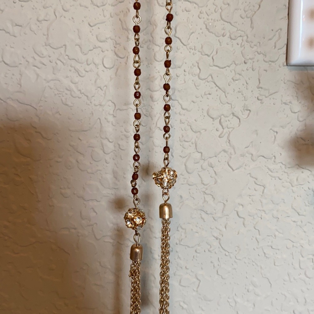 Long brown beaded lariat necklace